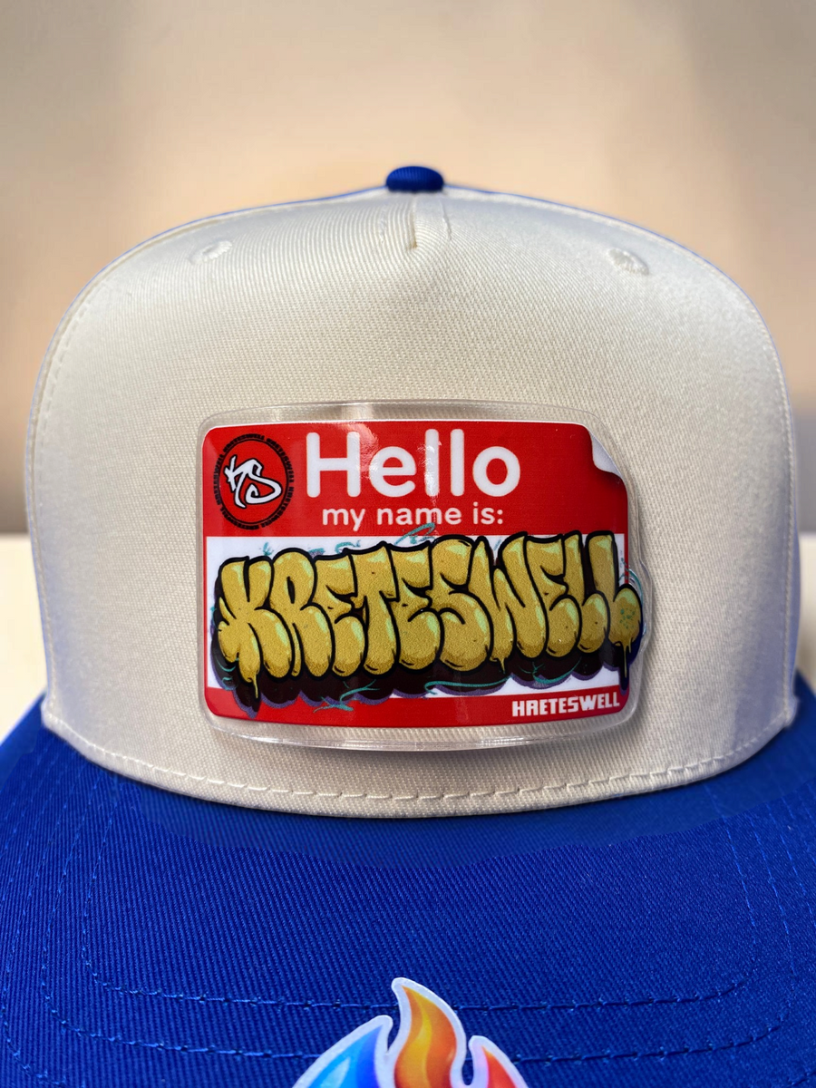Hello Kreteswell Drop on a blue and cream hat