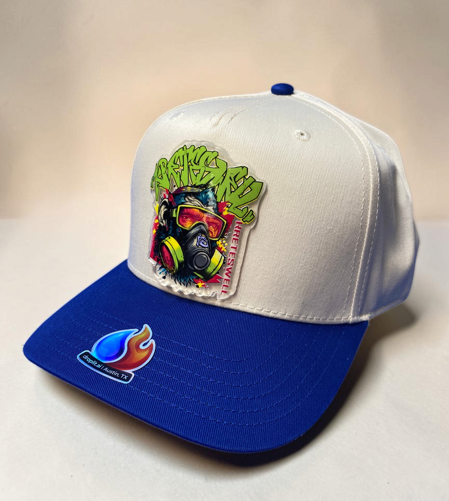 Graffiti monkey Drop on a blue and cream hat